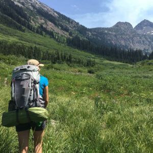 backpacker hiking trail in yellowstone